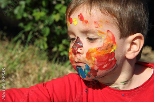 Canvas Print child with his face painted