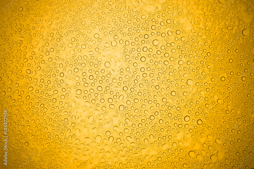 Water drops on yellow glass, Rain droplets on glass background. Water drops on yellow glass, Rain droplets on glass background.