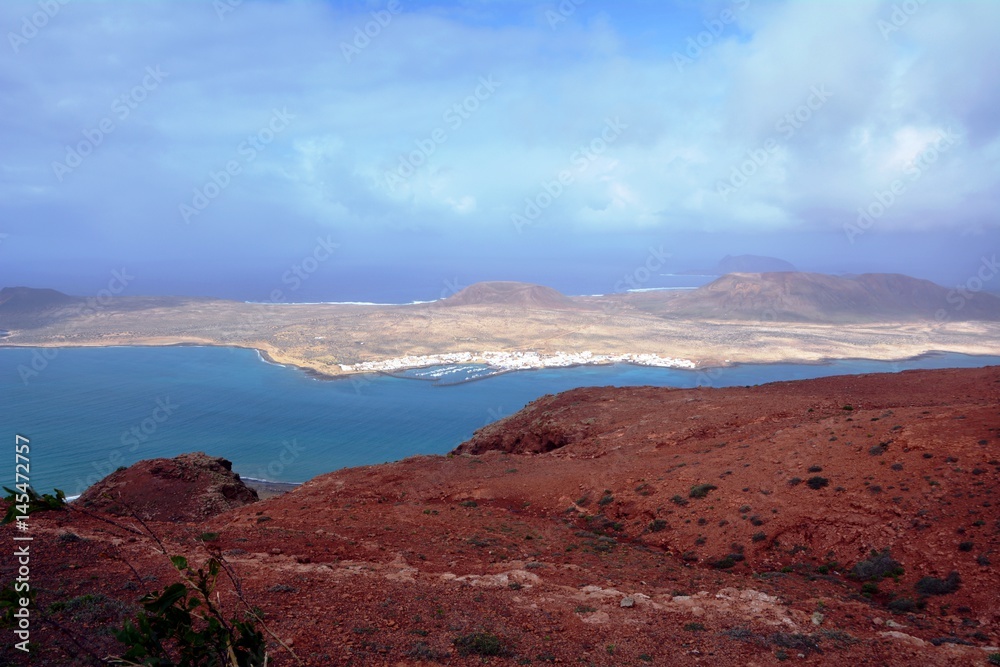 Landscape over Island La Graciosa taken from north of Lanzarote. Canary Islands. Spain.