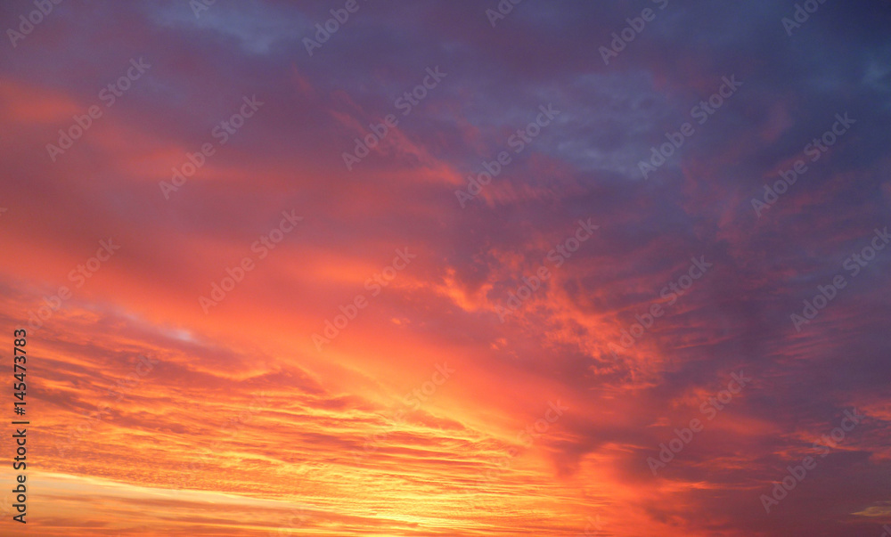 Dramatic sunset sky with clouds. Natural Background