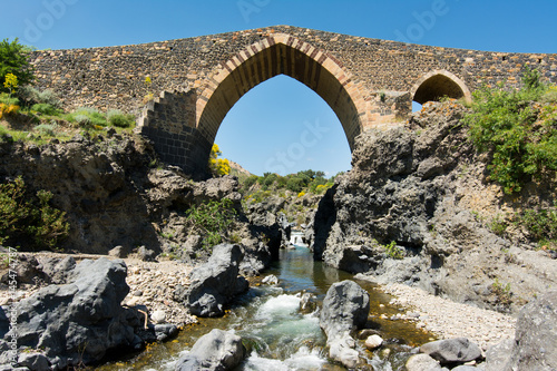 Medieval bridge of Adrano, Sicily, of arabic origin and saracen photo