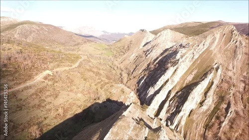 Vuelo de dron sobre creston calizo en la montaña central leonesa, cordillera cantabrica photo