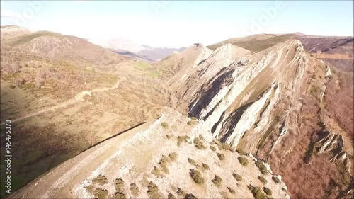 Vuelo de dron sobre creston calizo en la montaña central leonesa photo