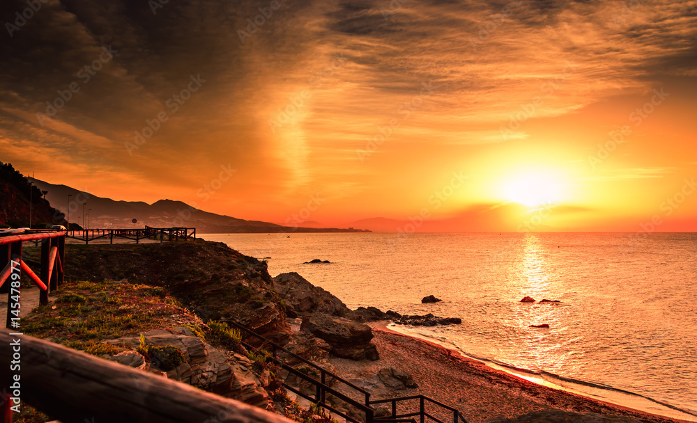 Fototapeta premium Sunrise on the Sunshine Coast,Spain.
