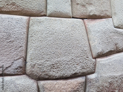 Inca wall made of natural volcanic stones. Cusco Peru photo