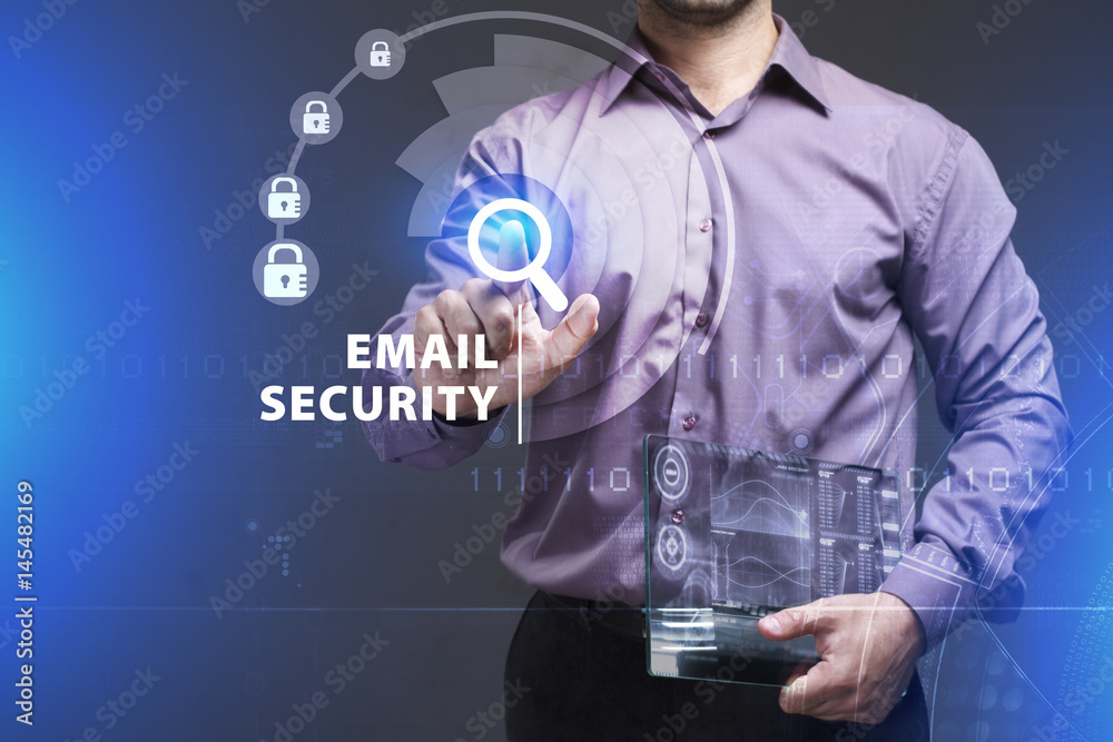Business, Technology, Internet and network concept. Young businessman working on a virtual screen of the future and sees the inscription: Email security Business, Technology, Internet and network concept. Young businessman working on a virtual screen of the future and sees the inscription: Email security