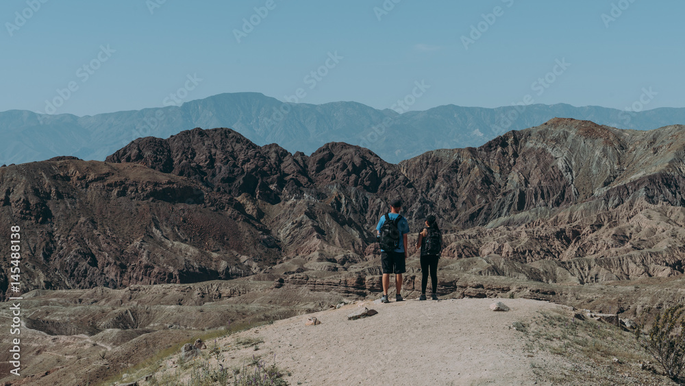 Couple visiting Painted canyon landscape view, California beautiful natural features	