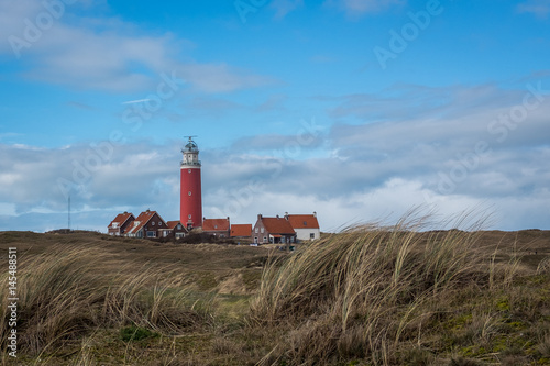 Panoramic view on the old lighthouse near De Cocksdorp, in Texel, The Netherlands.