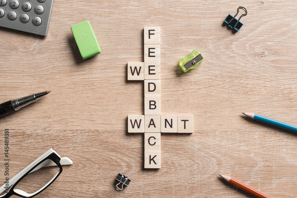 Conceptual business keywords on table with elements of game making crossword Conceptual business keywords on table with elements of game making crossword