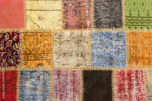 Texture of a piece of old carpet to sew thick threads 