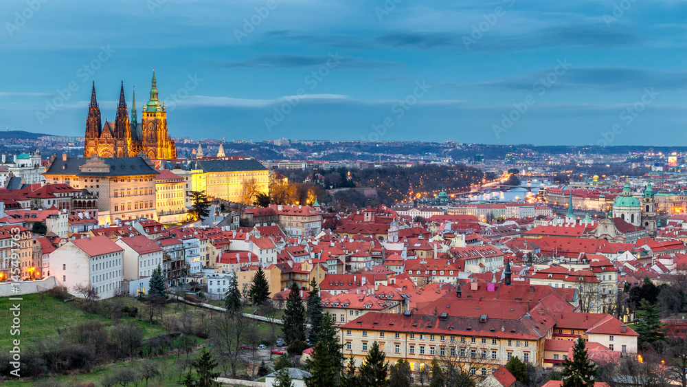 Prague Castle complex with gothic St Vitus Cathedral, Hradcany, Prague, Czech Republic. UNESCO World Heritage. Panoramic aerial shot from Petrin Hill. Prague Castle complex with gothic St Vitus Cathedral, Hradcany, Prague, Czech Republic. UNESCO World Heritage. Panoramic aerial shot from Petrin Hill.