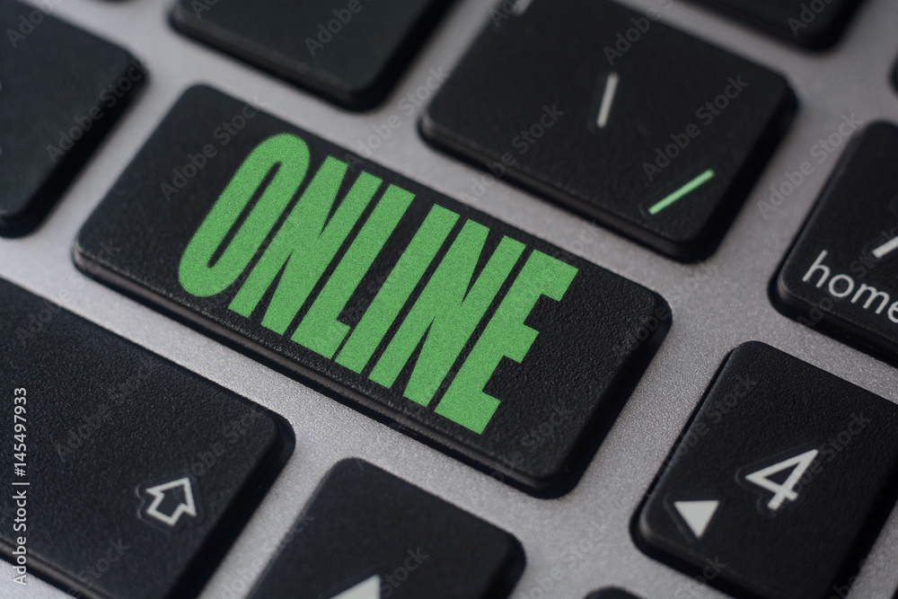 Key with text Online on laptop keyboard Key with text Online on laptop keyboard