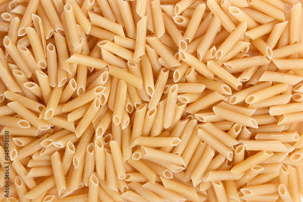 Italian Macaroni Pasta raw food background or texture close up Italian Macaroni Pasta raw food background or texture close up