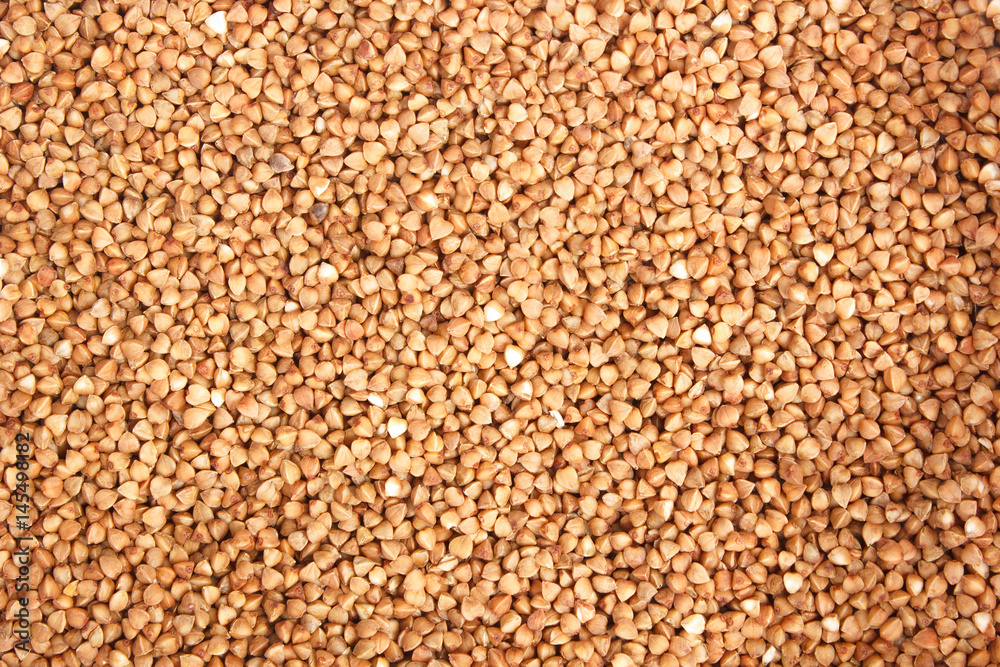 raw buckwheat grains background texture raw buckwheat grains background texture