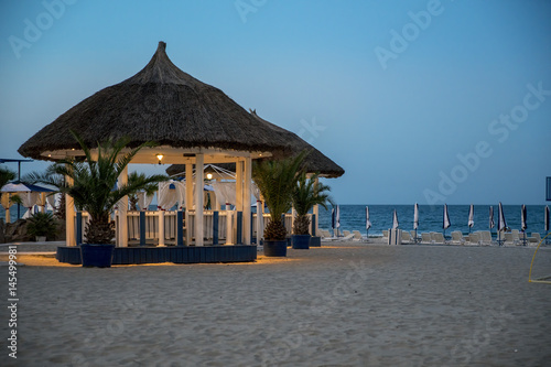 Luxury tropical beach restaurant at night