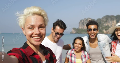 Girl Welcome People Group To Take Selfie Photo On Beach On Cell Smart Phone Happy Cheerful Tourists On Vacation Slow Motion 60