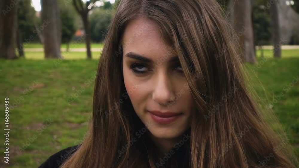 Beautiful blue-eyed girl, raises her eyes sky-slow motion Beautiful blue-eyed girl, raises her eyes sky-slow motion