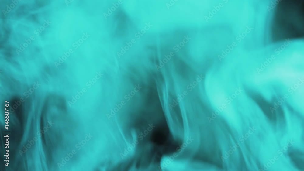 real cyan smoke on balck background - ideal for transition or background