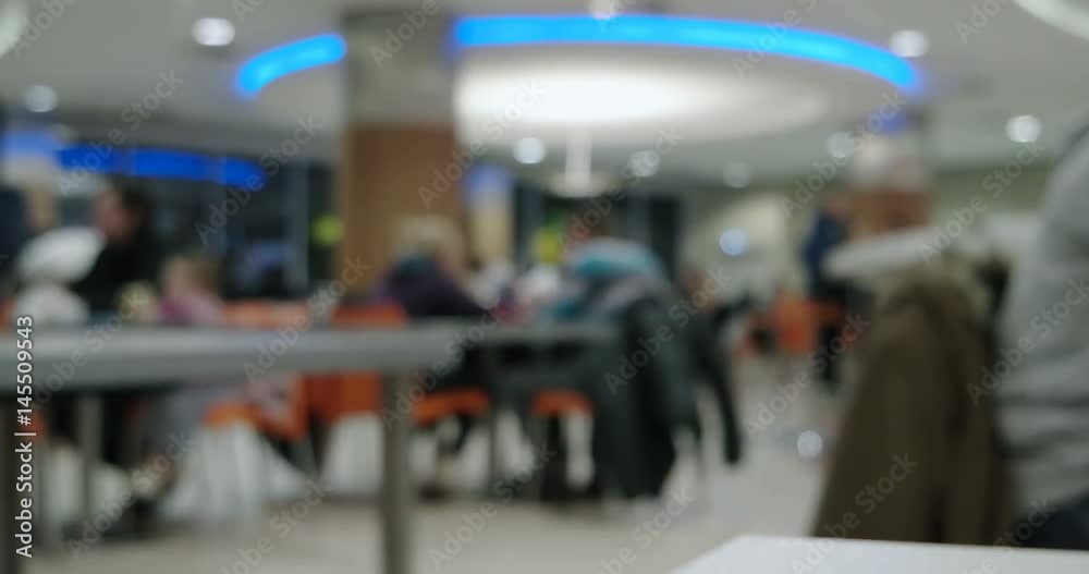 Defocused People in food court Defocused People in food court