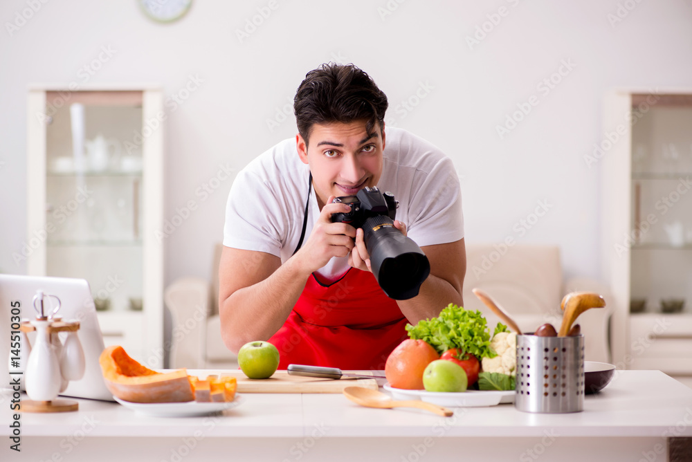 Food photographer taking photos in kitchen Food photographer taking photos in kitchen