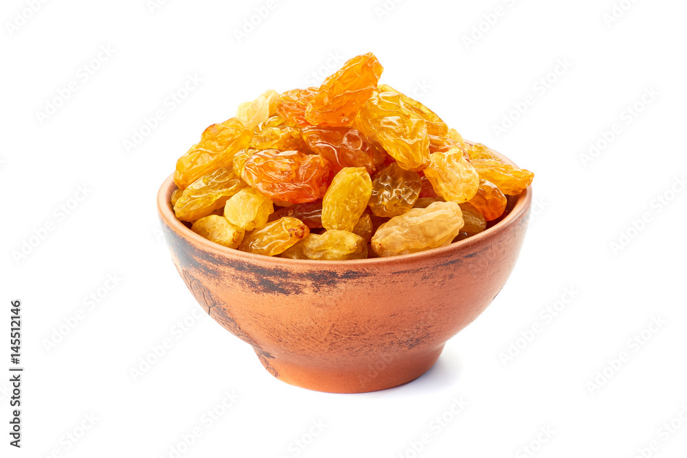 Ceramic bowl with golden raisins on white Ceramic bowl with golden raisins on white