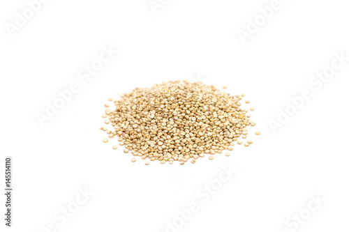 Heap of healthy quinoa seeds isolated on white