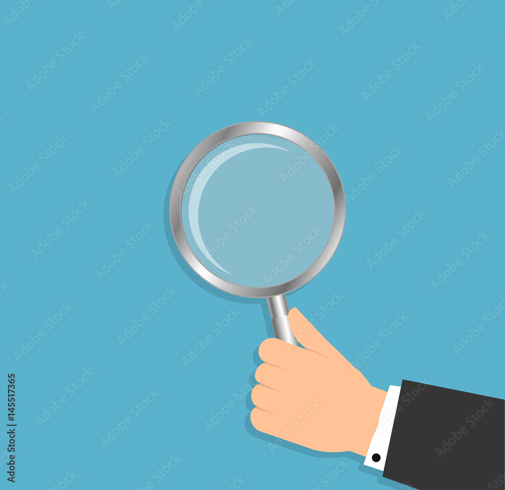hand holding a magnifying glass. vector illustration in flat design on blue background hand holding a magnifying glass. vector illustration in flat design on blue background