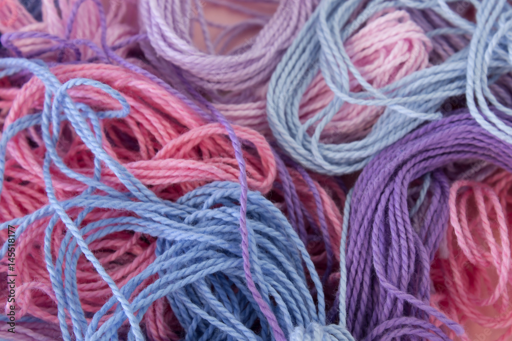 Pastel Pink,Purple and Blue Cotton Embroidery threads background