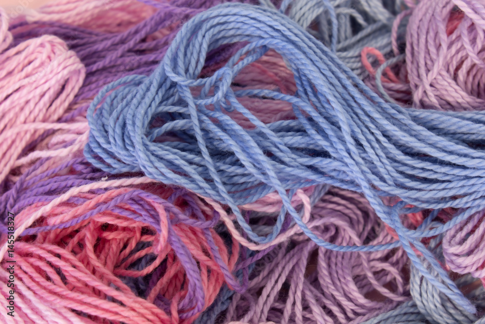 Pastel Pink,Purple and Blue Cotton Embroidery threads background