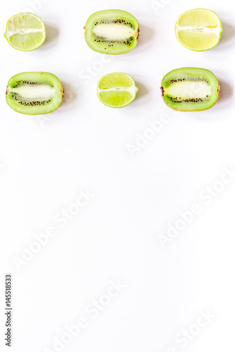 Tropical fruit design on white table background top view space for text