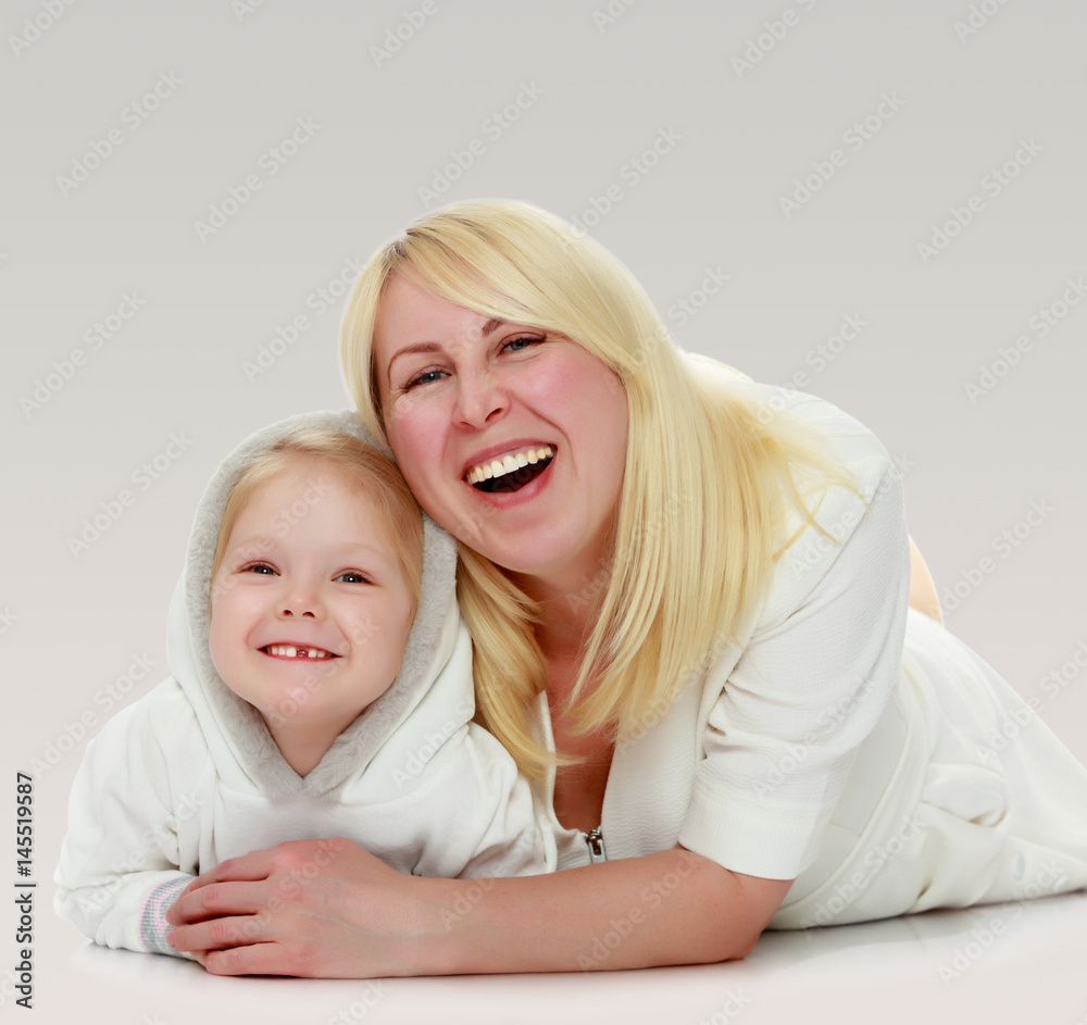 Mother and little daughter hugging. Mother and little daughter hugging.