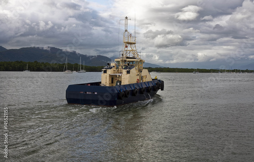 tug boat coming into harbor