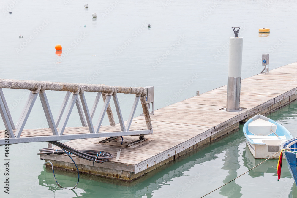 Slope walkway to the wooden dock of Fisherman village. Slope walkway to the wooden dock of Fisherman village.