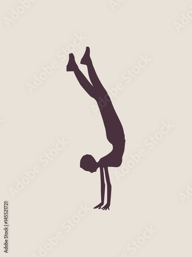 Sporty beautiful young woman working out  doing handstand. Vector silhouette illustration isolated on grey background. Yoga and fitness training theme