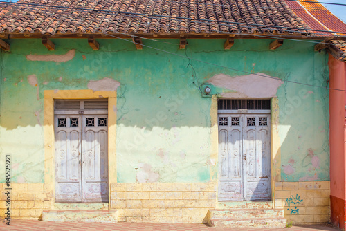 Facade of colorful house in the historic district Granada in Nicaragua © Marek Poplawski