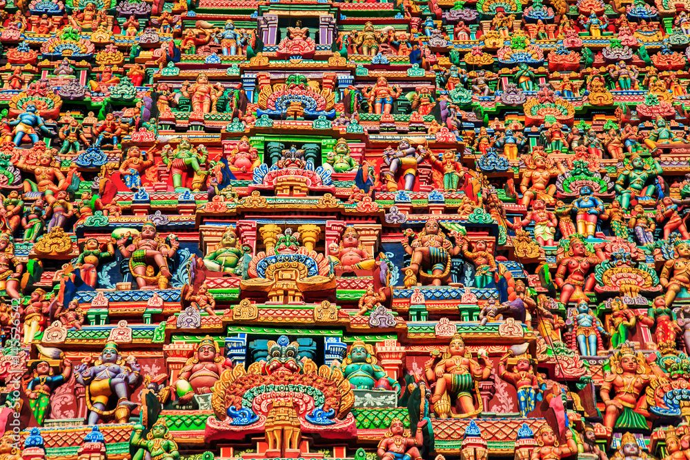 Fototapeta premium Colorful carved walls of the Indian temple.