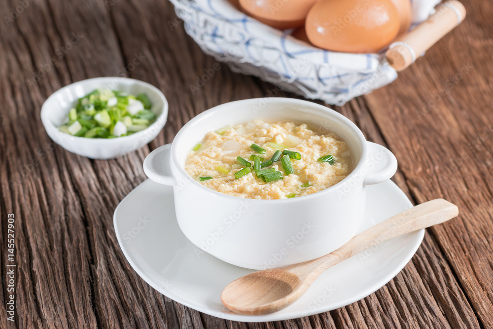 Egg drop soup in white bowl. Egg drop soup in white bowl.