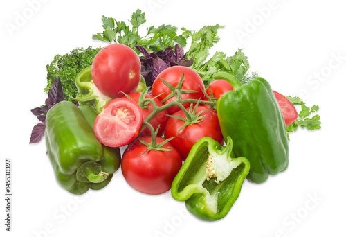 Branch of the tomatoes, green bell peppers and greenery