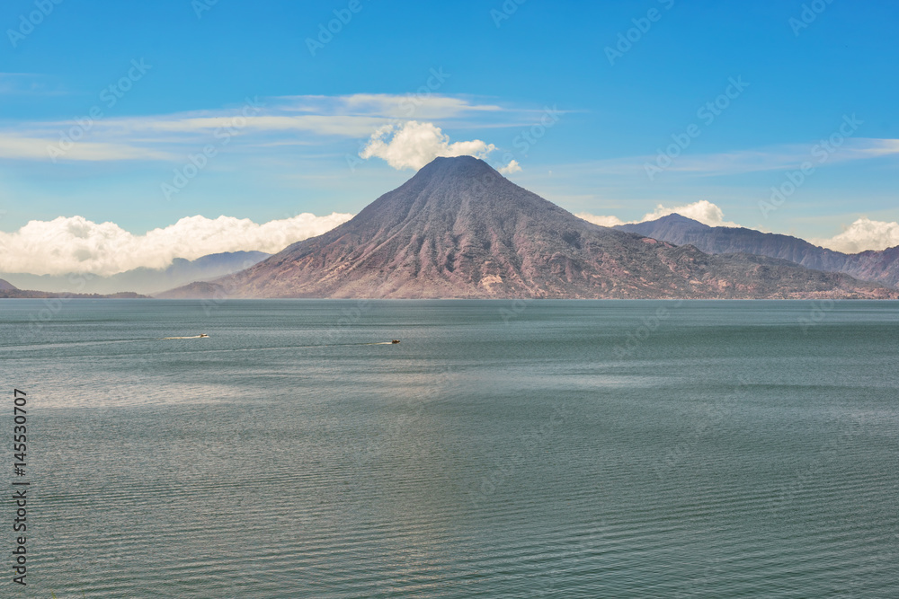 Picture of a volcano on the far side of Lake Atitlan from Panajachel, Guatemala. Picture of a volcano on the far side of Lake Atitlan from Panajachel, Guatemala.