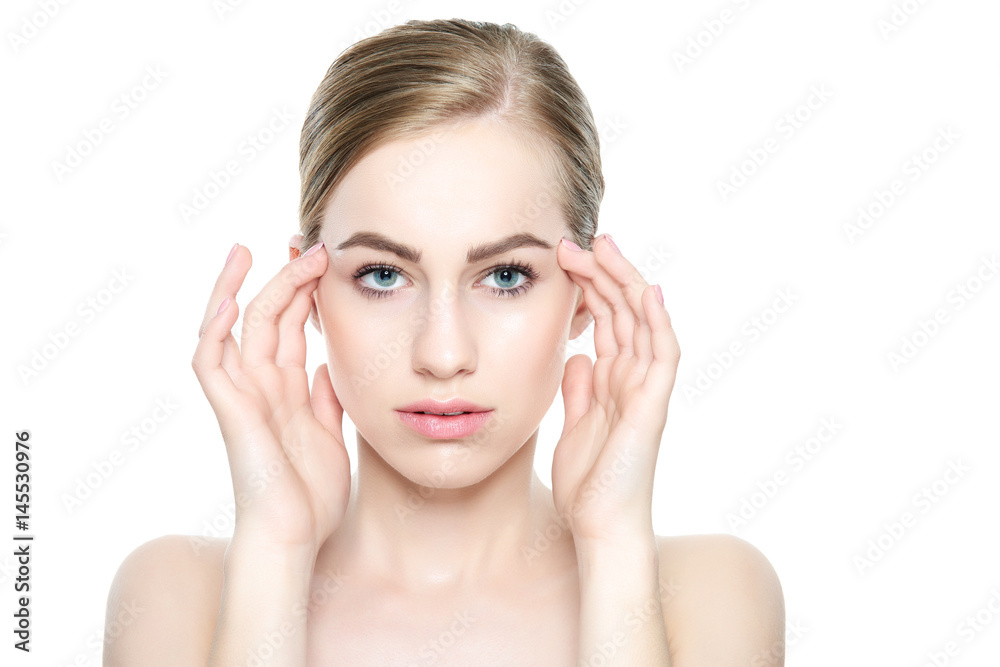 Beautiful Young Blond Woman with Perfect Skin touching her face. Facial treatment. Cosmetology, beauty and spa concept. Isolated on white background. Beautiful Young Blond Woman with Perfect Skin touching her face. Facial treatment. Cosmetology, beauty and spa concept. Isolated on white background.