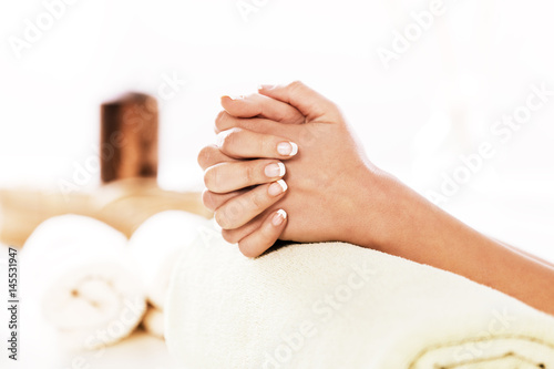 Enjoying Hand and Nail Treatment in Spa.