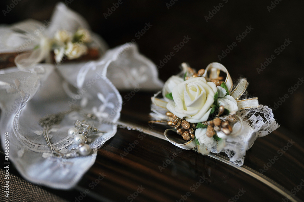 Accessories for bride: earrings with buttonhole.