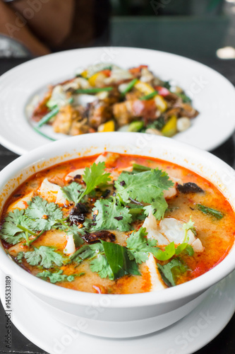 Thai spicy and sour soup with prawn (Tom Yum Goong), popular Thai cuisine