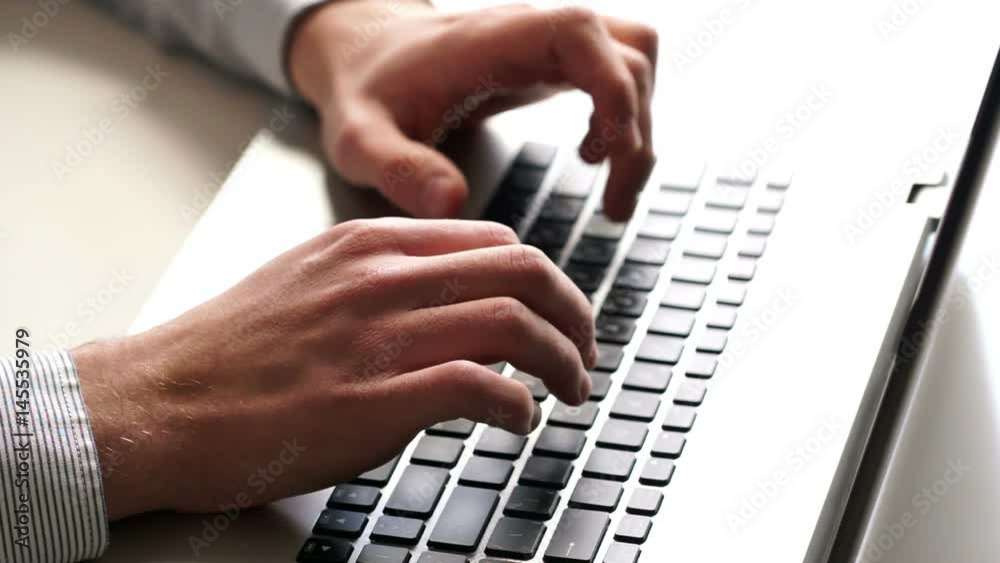 Close-up of hands and keyboard. Clerk working on laptop. Business and office concept. Close-up of hands and keyboard. Clerk working on laptop. Business and office concept.