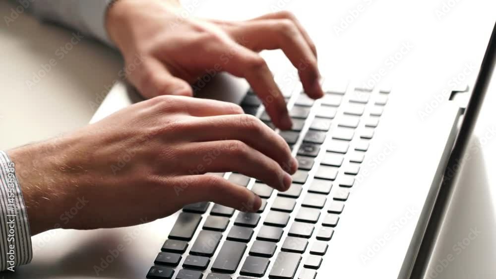 Close-up of hands and keyboard. Clerk working on laptop. Business and office concept. Close-up of hands and keyboard. Clerk working on laptop. Business and office concept.