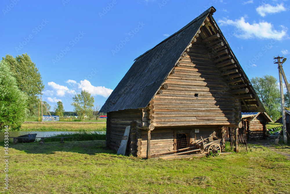 Wooden barn in the village, Russia Wooden barn in the village, Russia