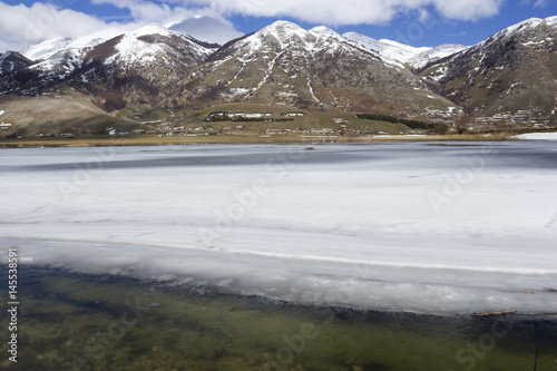 view of frozen mountain lake in matese park