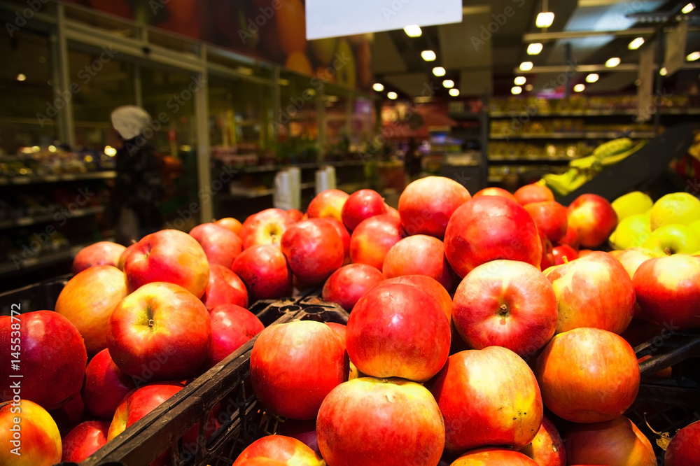 Apples on boxes in supermarket Apples on boxes in supermarket