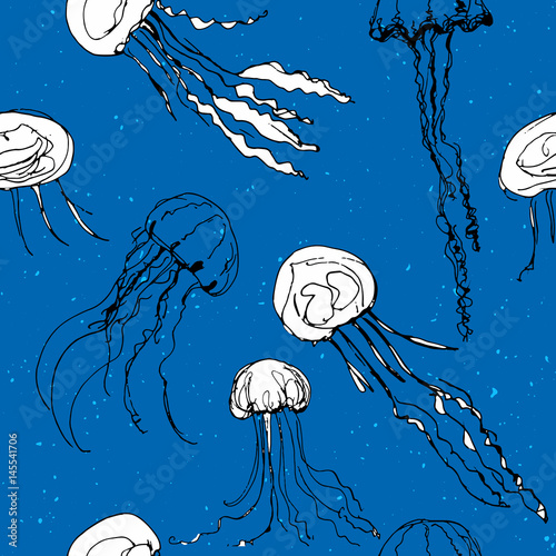 Jellyfish hand drawn graphic ink pattern. White medusa on blue background very fresh and summer image. 