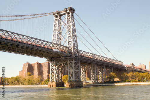 Fototapeta Naklejka Na Ścianę i Meble -  Part of a bridge in New York, view from a boat